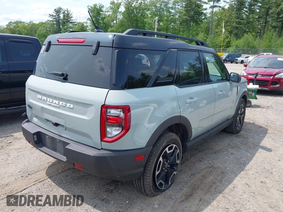 2023 Ford Bronco Sport Outer Banks z VIN 3FMCR9C64PRD05448, wystawiony jako IAAI lot #42375732 z przebiegiem 53 538 mil mil oraz . Historia ofert i sprzedaży dostępna na DreamBid. Obrazek 4.