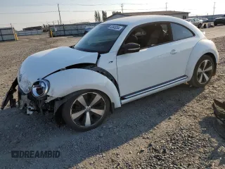 2016 Volkswagen Beetle Turbo R-Line with VIN 3VWVT7AT9GM602303, listed as a Copart auction lot 63845354 with 65,796 mi miles and Salvage Title. Bid and sale history available at DreamBid. Image 1.