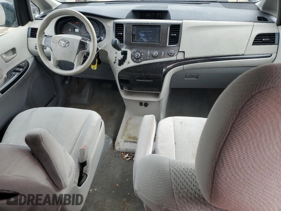 2012 Toyota Sienna with VIN 5TDKA3DC5CS013775, listed as a Copart auction lot 46312695 with 218,890 mi miles and Salvage Title. Bid and sale history available at DreamBid. Image 8.