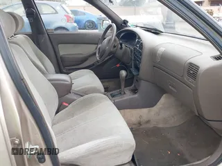 1994 Toyota Camry LE with VIN JT2SK12E0R0269820, listed as a IAAI auction lot 41908360 with 184,739 mi miles. Bid and sale history available at carsss.com. Image 5.