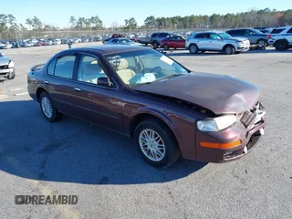 1998 Nissan Maxima GXE z VIN JN1CA21D6WM924907, wystawiony jako IAAI lot #41620753 z przebiegiem 145 572 mil mil oraz . Historia ofert i sprzedaży dostępna na DreamBid. Obrazek 1.