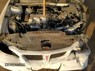 2004 Pontiac Grand Am SE1 with VIN 1G2NF52E24C147066, listed as a Copart auction lot 84556084 with 138,490 mi miles and Salvage Title. Bid and sale history available at carsss.com. Image 12.