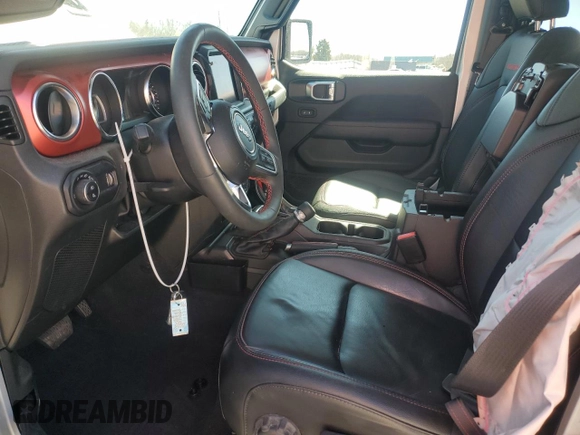 2023 Jeep Gladiator Rubicon with VIN 1C6JJTBG6PL579895, listed as a Copart auction lot 49588395 with 22,066 mi miles and Salvage title. Bid and sale history available at DreamBid. Image 7.