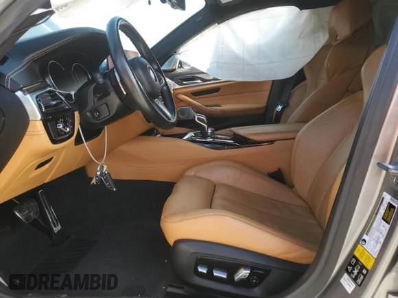 2019 BMW M5 Competition z VIN WBSJF0C54KB284808, wystawiony jako Copart lot #71974952 z przebiegiem 26 888 mil mil oraz . Historia ofert i sprzedaży dostępna na DreamBid. Obrazek 7.