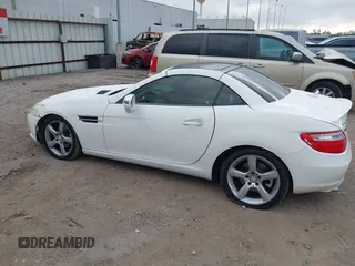 2014 Mercedes-Benz SLK 250 with VIN WDDPK4HA7EF081313, listed as a IAAI auction lot 41520329 with 53,031 mi miles and . Bid and sale history available at DreamBid. Image 14.