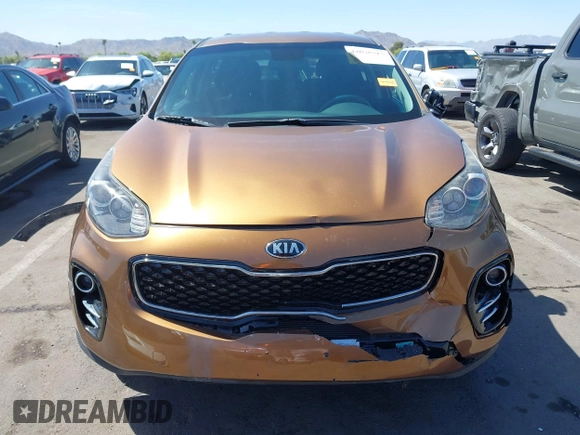 2017 Kia Sportage LX z VIN KNDPMCAC5H7121297, wystawiony jako IAAI lot #42088915 z przebiegiem 91 374 mil mil oraz . Historia ofert i sprzedaży dostępna na DreamBid. Obrazek 12.