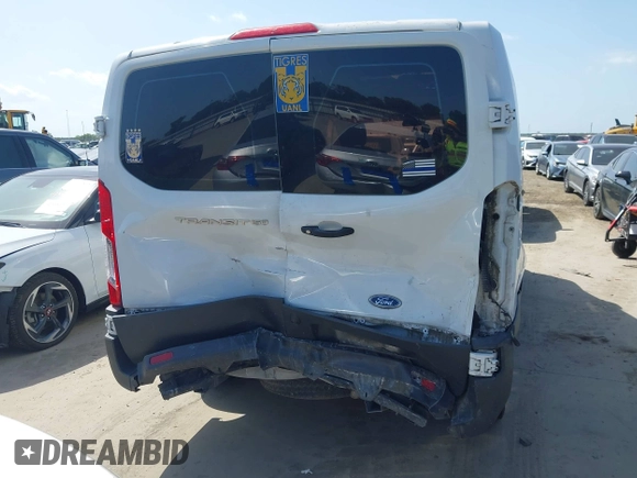 2018 Ford Transit with VIN 1FTYE1ZM0JKA43498, listed as a IAAI auction lot 42514847 with 131,539 mi miles and . Bid and sale history available at DreamBid. Image 16.