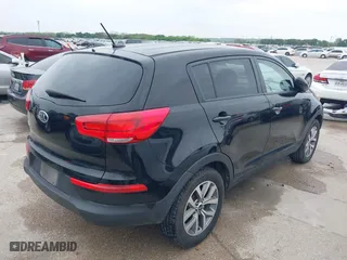 2015 Kia Sportage LX with VIN KNDPB3AC3F7704065, listed as a IAAI auction lot 41932317 with 172,338 mi miles. Bid and sale history available at carsss.com. Image 4.