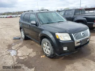 2011 Mercury Mariner with VIN 4M2CN8B7XBKJ01717, listed as a IAAI auction lot 42030587 with 115,766 mi miles. Bid and sale history available at carsss.com. Image 1.