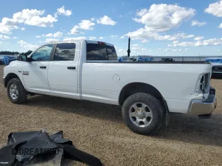 2018 Ram 2500 SLT with VIN 3C6TR5JT7JG403230, listed as a Copart auction lot 56145085 with 228,446 mi miles and Salvage title. Bid and sale history available at DreamBid. Image 2.