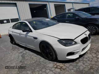 2015 BMW M6 z VIN WBS6C9C52FD467752, wystawiony jako Copart lot #67884554 z przebiegiem 60 729 mil mil oraz Szkody całkowita. Historia ofert i sprzedaży dostępna na DreamBid. Obrazek 4.