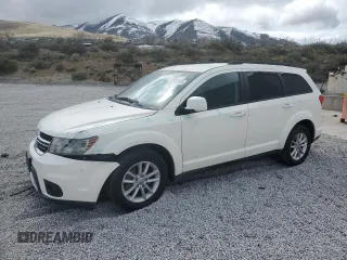 2013 Dodge Journey SXT with VIN 3C4PDDBG1DT619798, listed as a Copart auction lot 51820685 with 209,404 mi miles and Salvage Title. Bid and sale history available at DreamBid. Image 1.