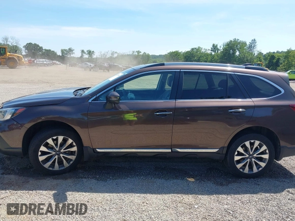 2019 Subaru Outback Touring with VIN 4S4BSATC7K3246765, listed as a IAAI auction lot 42793821 with 57,110 mi miles and . Bid and sale history available at DreamBid. Image 14.