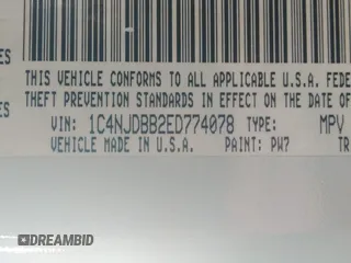 2014 Jeep Compass Sport with VIN 1C4NJDBB2ED774078, listed as a IAAI auction lot 42038110 with 104,606 mi miles. Bid and sale history available at carsss.com. Image 9.