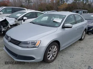 2013 Volkswagen Jetta Sedan SE with VIN 3VWDP7AJ3DM211027, listed as a IAAI auction lot 41849198 with 125,624 mi miles. Bid and sale history available at carsss.com. Image 2.