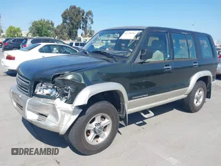 2002 Isuzu Trooper S z VIN JACDJ58X427J08532, wystawiony jako IAAI lot #42228494 z przebiegiem Nie podano mil oraz . Historia ofert i sprzedaży dostępna na DreamBid. Obrazek 2.