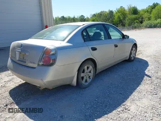 2002 Nissan Altima S with VIN 1N4AL11D12C166490, listed as a IAAI auction lot 42056634 with 203,367 mi miles. Bid and sale history available at carsss.com. Image 4.