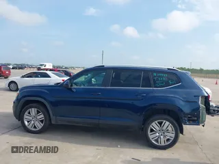 2019 Volkswagen Atlas SE with VIN 1V2WR2CA8KC618988, listed as a IAAI auction lot 42212845 with 60,481 mi miles and . Bid and sale history available at DreamBid. Image 14.