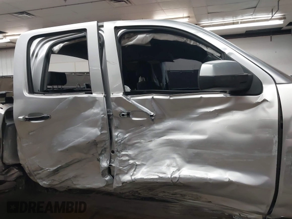 2018 Chevrolet Silverado 1500 LT with VIN 1GCVKREC1JZ151188, listed as a IAAI auction lot 42153618 with 82,391 mi miles and . Bid and sale history available at DreamBid. Image 14.