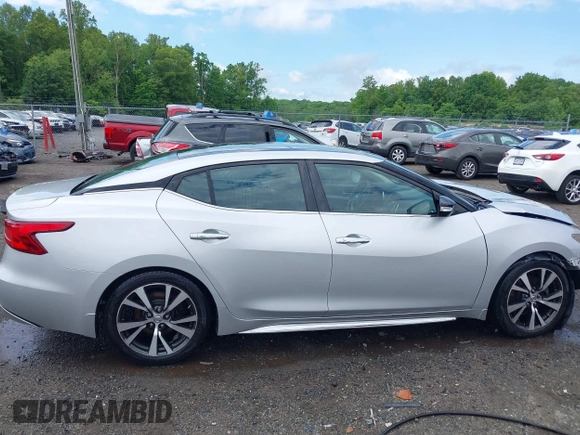 2016 Nissan Maxima SV with VIN 1N4AA6AP5GC900892, listed as a IAAI auction lot 42139043 with 325,228 mi miles and . Bid and sale history available at DreamBid. Image 14.