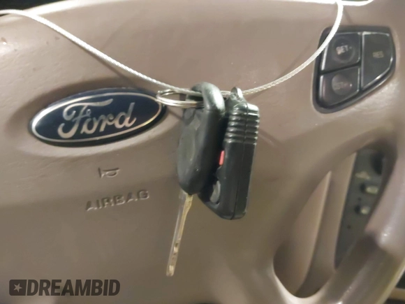 2003 Ford Taurus SES Standard with VIN 1FAFP552X3G184894, listed as a IAAI auction lot 41846677 with 160,824 mi miles. Bid and sale history available at carsss.com. Image 11.