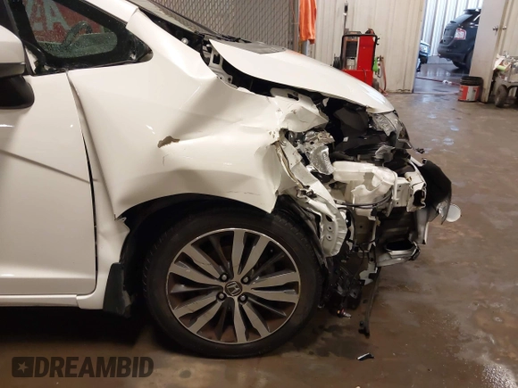 2015 Honda Fit EX-L with VIN 3HGGK5H88FM776996, listed as a IAAI auction lot 42431688 with 50,566 mi miles and . Bid and sale history available at DreamBid. Image 18.
