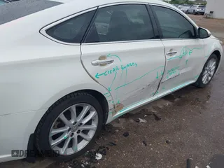 2013 Toyota Avalon XLE z VIN 4T1BK1EB5DU062247, wystawiony jako IAAI lot #42194529 z przebiegiem 189 092 mil mil oraz . Historia ofert i sprzedaży dostępna na DreamBid. Obrazek 6.