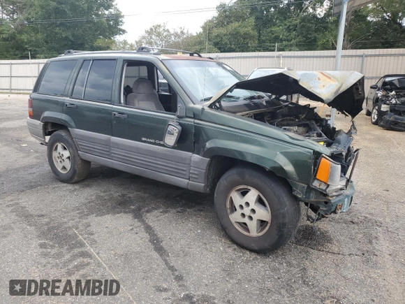 1995 Jeep Grand Cherokee Laredo with VIN 1J4FX58S0SC726476, listed as a Copart auction lot 69608784 with 264,705 mi miles and Salvage Title. Bid and sale history available at carsss.com. Image 4.