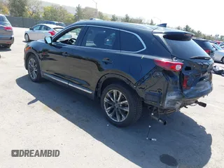 2016 Mazda CX-9 Grand Touring with VIN JM3TCBDY4G0113693, listed as a IAAI auction lot 41965857 with 152,403 mi miles and . Bid and sale history available at DreamBid. Image 3.