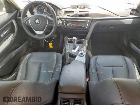 2013 BMW 3 Series 328i with VIN WBA3A5G55DNP21848, listed as a Copart auction lot 61733995 with 134,760 mi miles and Salvage title. Bid and sale history available at DreamBid. Image 8.