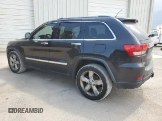 2013 Jeep Grand Cherokee Overland with VIN 1C4RJECT7DC526119, listed as a Copart auction lot 60735594 with 143,454 mi miles and Clean Title. Bid and sale history available at carsss.com. Image 2.