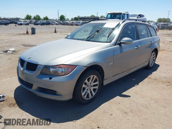 2007 BMW 3 Series 328xi with VIN WBAVT73507FZ36203, listed as a IAAI auction lot 42709273 with 208,428 mi miles and . Bid and sale history available at DreamBid. Image 2.