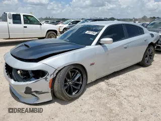 2019 Dodge Charger Scat Pack z VIN 2C3CDXGJ9KH742490, wystawiony jako Copart lot #53571945 z przebiegiem 18 861 mil mil oraz Szkoda całkowita • Salvage title. Historia ofert i sprzedaży dostępna na DreamBid. Obrazek 1.