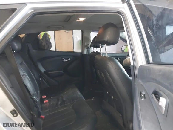2011 Hyundai Tucson Limited with VIN KM8JUCAC2BU156616, listed as a IAAI auction lot 41788854 with 193,978 mi miles. Bid and sale history available at carsss.com. Image 8.