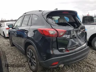 2016 Mazda CX-5 Grand Touring with VIN JM3KE4DY2G0738899, listed as a Copart auction lot 50943255 with 80,807 mi miles and Salvage Title. Bid and sale history available at carsss.com. Image 2.