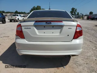 2012 Ford Fusion SEL z VIN 3FAHP0JA3CR336743, wystawiony jako Copart lot #45455065 z przebiegiem 126 456 mil mil oraz Szkody całkowita. Historia ofert i sprzedaży dostępna na DreamBid. Obrazek 6.
