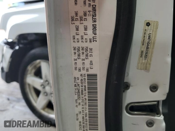 2011 Jeep Patriot Sport with VIN 1J4NT1GA4BD263521, listed as a Copart auction lot 54666735 with 176,606 mi miles and Salvage title. Bid and sale history available at DreamBid. Image 12.