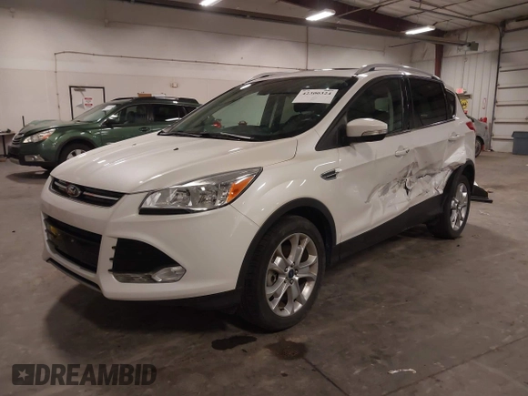 2016 Ford Escape Titanium with VIN 1FMCU9J99GUA61848, listed as a IAAI auction lot 42300324 with 51,692 mi miles and . Bid and sale history available at DreamBid. Image 2.