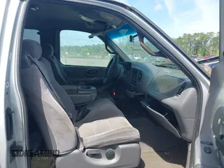 2002 Ford F-150 XL with VIN 1FTRX17W22NA55784, listed as a IAAI auction lot 41958686 with 278,064 mi miles. Bid and sale history available at carsss.com. Image 5.