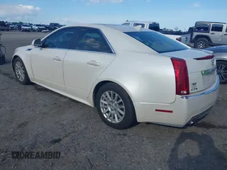2010 Cadillac CTS Luxury with VIN 1G6DE5EG9A0118042, listed as a IAAI auction lot 42448076 with 142,359 mi miles and . Bid and sale history available at DreamBid. Image 3.