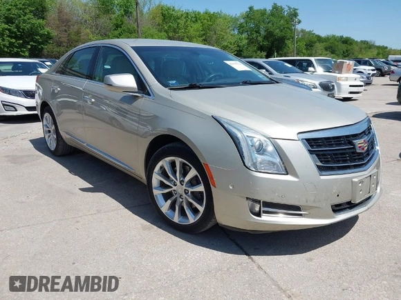 2016 Cadillac XTS Luxury Collection with VIN 2G61M5S31G9146455, listed as a IAAI auction lot 42019234 with 72,019 mi miles. Bid and sale history available at carsss.com. Image 1.