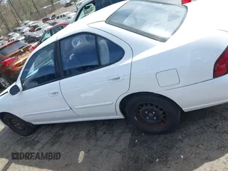2002 Nissan Sentra GXE z VIN 3N1CB51D12L649594, wystawiony jako IAAI lot #41758242 z przebiegiem 274 883 mil mil oraz . Historia ofert i sprzedaży dostępna na DreamBid. Obrazek 14.
