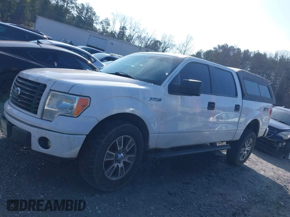 2014 Ford F-150 XL with VIN 1FTFW1EF2EFB93610, listed as a IAAI auction lot 41515501 with 211,415 mi miles and . Bid and sale history available at DreamBid. Image 14.