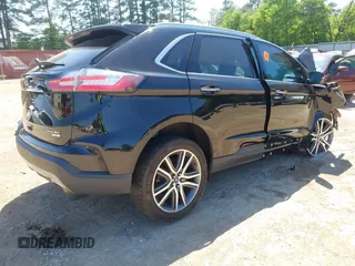 2019 Ford Edge Titanium z VIN 2FMPK3K9XKBC73014, wystawiony jako IAAI lot #42039957 z przebiegiem Nie podano mil oraz . Historia ofert i sprzedaży dostępna na DreamBid. Obrazek 4.