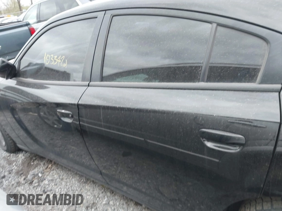 2015 Dodge Charger SE with VIN 2C3CDXBG7FH841469, listed as a IAAI auction lot 42001599 with 103,342 mi miles and . Bid and sale history available at DreamBid. Image 14.