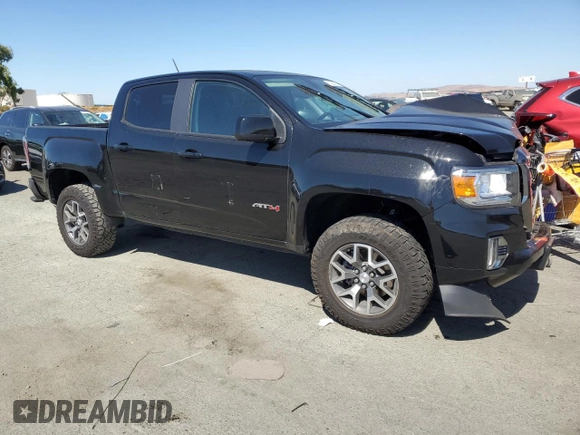 2021 GMC Canyon 4WD AT4 w/Cloth with VIN 1GTG6FEN4M1268263, listed as a Copart auction lot 72393764 with 42,249 mi miles and Salvage Title. Bid and sale history available at carsss.com. Image 4.