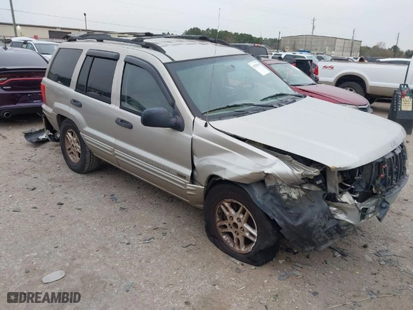 2004 Jeep Grand Cherokee Laredo with VIN 1J4GX48S44C301120, listed as a IAAI auction lot 41281556 with 267,246 mi miles. Bid and sale history available at carsss.com. Image 1.