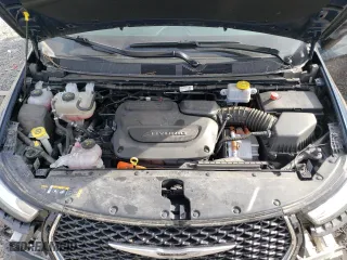 2023 Chrysler Pacifica Hybrid Touring L with VIN 2C4RC1L70PR614642, listed as a Copart auction lot 45933065 with 94,992 mi miles and Salvage Title. Bid and sale history available at carsss.com. Image 12.