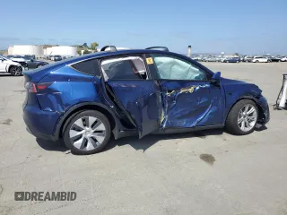2023 Tesla Model Y Long Range with VIN 7SAYGAEE8PF927092, listed as a Copart auction lot 53917185 with 17,639 mi miles and Salvage Title. Bid and sale history available at DreamBid. Image 3.