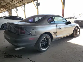 1997 Ford Mustang Cobra with VIN 1FALP47V8VF103811, listed as a Copart auction lot 56455324 with 129,499 mi miles and Salvage Title. Bid and sale history available at carsss.com. Image 3.